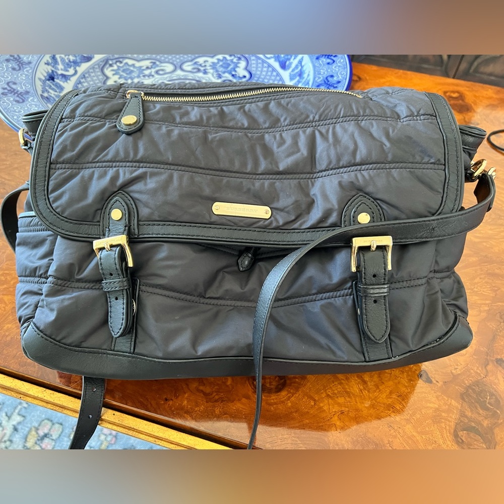 Burberry messenger diaper bag.